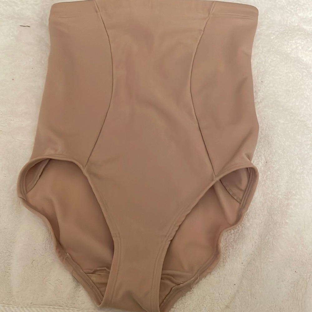 Womens miraclesuit shapewear brief size large. Beige. See measurements & photos